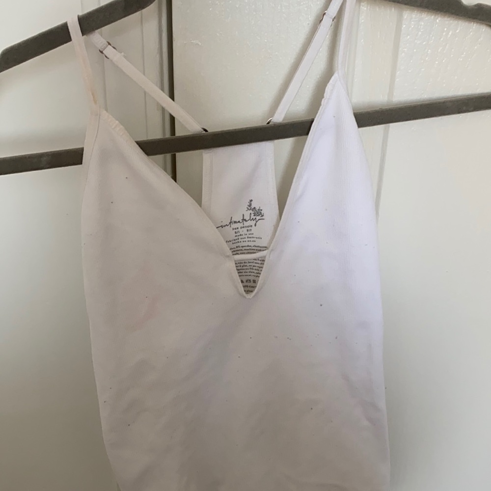 white Free People bodysuit